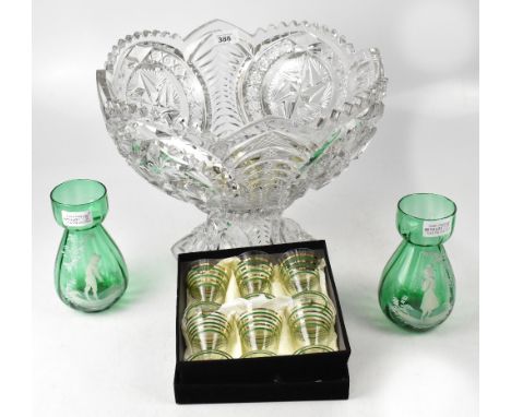 A large and impressive press moulded clear glass fruit bowl with moulded star and fern decoration, with arched and serrated r