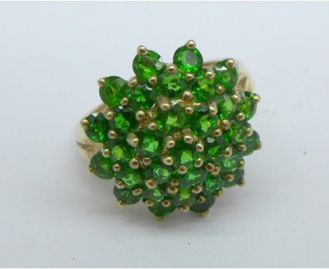 A 9ct gold and green stone cluster ring, 2.9, K