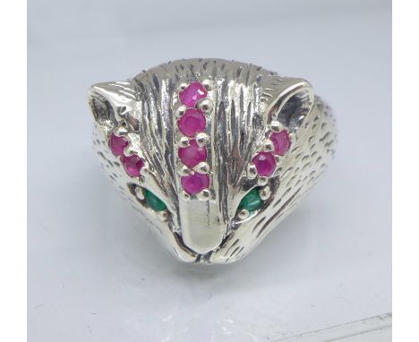 A silver cat ring set with rubies and emeralds, S
