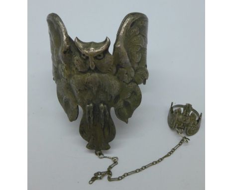 A metal owl bangle and ring