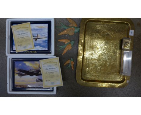 A set of three cast metal birds, two Davenport pottery plaques, Lancaster and Hurricane, brass tray, harmonica and matchbox h