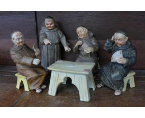Four continental card playing monk figures, two a/f