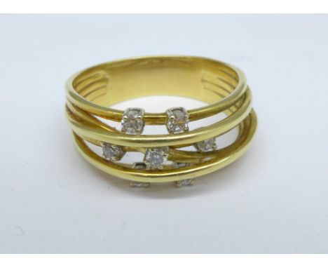 An 18ct gold and white stone ring, 9.5g, Z