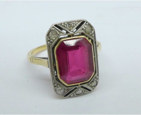 An Art Deco, yellow and white metal set rose cut diamond and red stone ring, 4.6g, O, ring top 17mm x 11mm