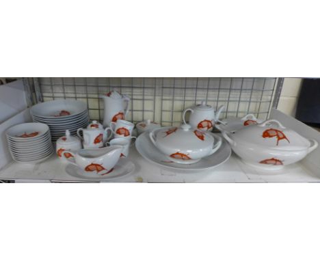 A large tea and dinner service decorated with koi carp, Hong Kong stamp to base, 155 pieces, hand painted