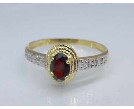 A 9ct gold, garnet and diamond ring, 1.2g, O