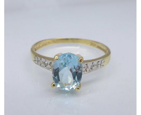 A 9ct gold, topaz and diamond ring, 1.2g, O