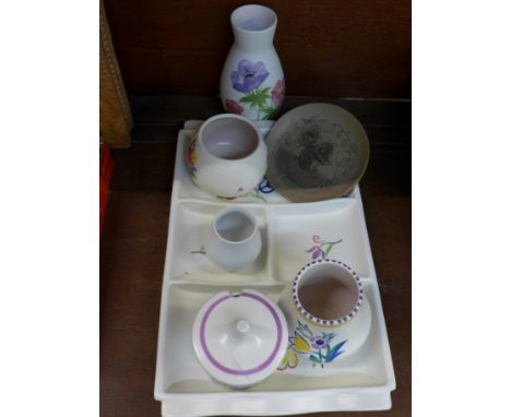 Poole ware; four vases, a jam pot and lid, a small plate and divided serving dish, (7)