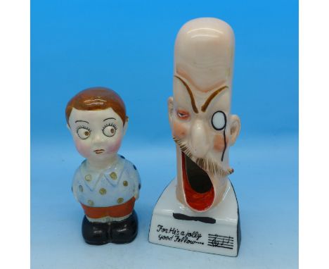 A German comic ash bowl or pot and Birks Rawlings Kewpie figure
