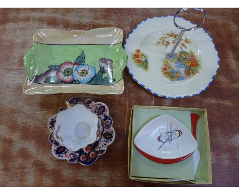 A Wileman daisy shape cup and saucer, an Anemone dish, Carlton ware butter dish and knife, boxed, and a Parrott & Co. cake st