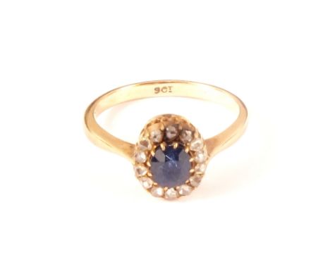 A 9ct gold sapphire and diamond cluster ring, size M