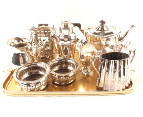 A silver plated three piece tea set, cocktail shaker plus other silver plate