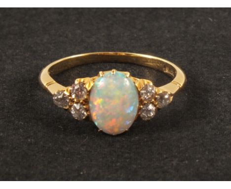 An 18ct gold opal and diamond ring, size N