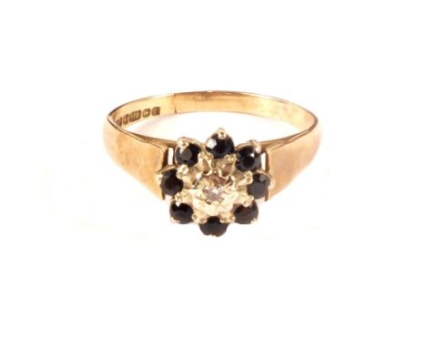 A 9ct gold sapphire and diamond cluster ring, size T