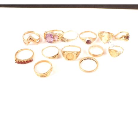 Thirteen various 9ct gold rings, some stone set (all as found), one set with small coin insert