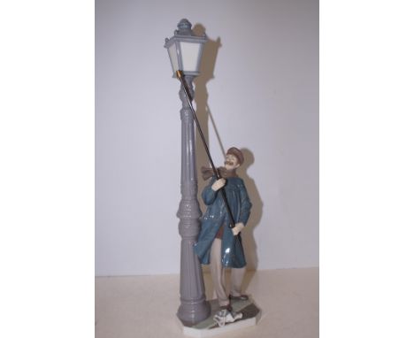 Lladro model of a lamp lighter 47cm