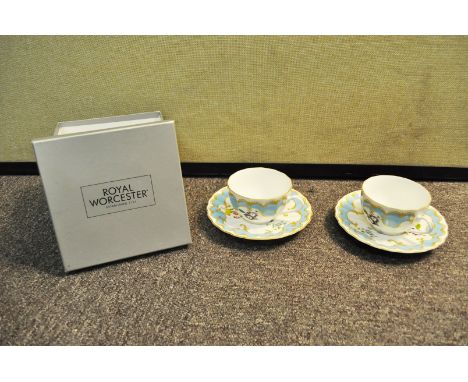 Two Royal Worcester cups and saucers
