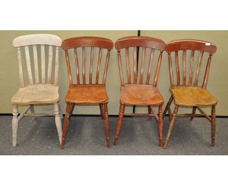 A set of four stick back chairs