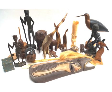 A quantity of African carved wood and other figures