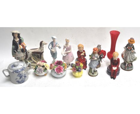 A group of china figures and other items