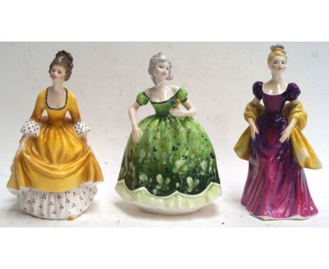 Two Doulton figures and another