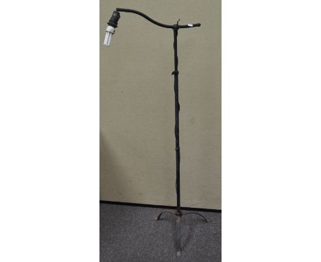 An adjustable standard lamp, 143cm high (max)