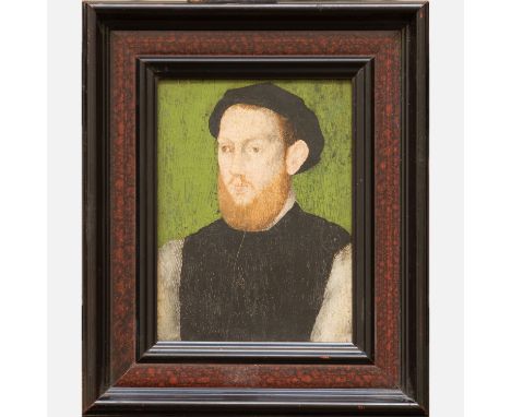 Francois Clouet (1510-1572)-studio. Portrait of a young bearded gentleman in black and white dress in front of a green backgr