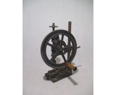 A vintage hand cranked pillar drill