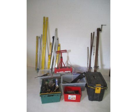 A large collection of tools including spirit levels, laser measure, Hilti drills, clamps, tool chest etc