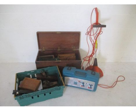A wooden trunk containing various vintage tools along with a Flymo strimmer, Boschmann drill etc.