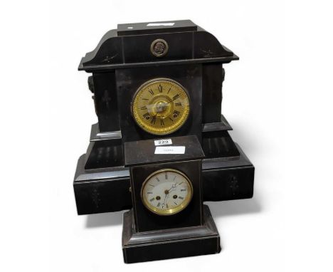 A large black slate mantel clock, with gilt metal wreath handles to the others below masks; and a small, plain black slate ma