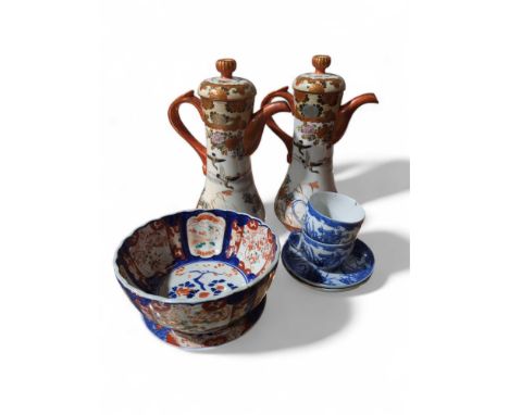 A pair of Japanese Satsuma style pots with covers; a hard paste bowl with coloured enamel decoration; a plate; and two cups a