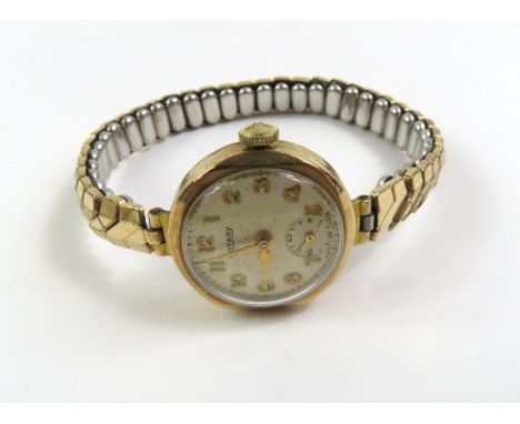 A ladies 9ct gold cased Rotary watch face, on expanding bracelet