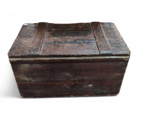 A 19th century stained pine storage trunk, with tin liner, 48cm high, 86cm wide, 52cm deep