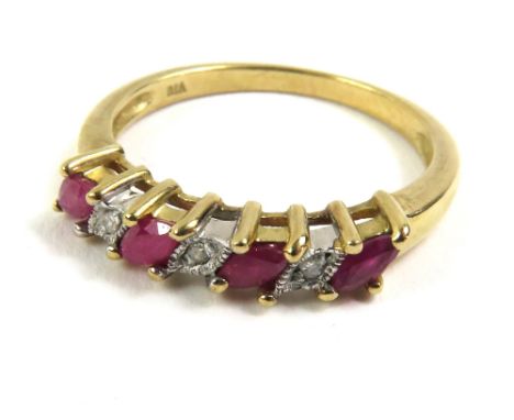 A 9ct gold ruby and diamond half eternity ring, finger size P 1/2, 2.5g gross