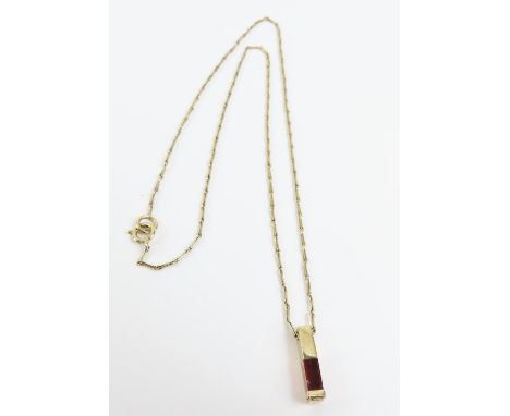 A contemporary garnet pendant, 1.5cm long, tests as 9ct gold, on a 9ct gold hayseed link chain, 38cm long, 3g gross, cased