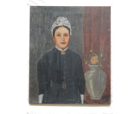 A late 19th century naive British school portrait study of a maid, oil on canvas, unsigned. 76 x 63cm