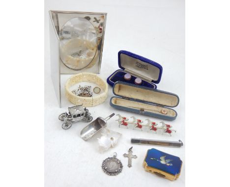 A Victorian gold stick pin, a silver pencil, assorted charms, a Georgian silver caddy scoop, and sundries. 