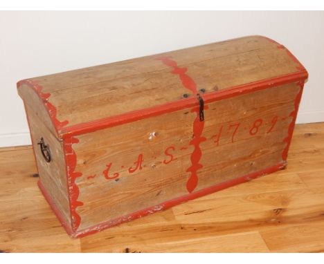 A 19th century Dutch painted dome top pine trunk, iron latch and strapwork, D handles, candle box, painted date. W. 116cm
