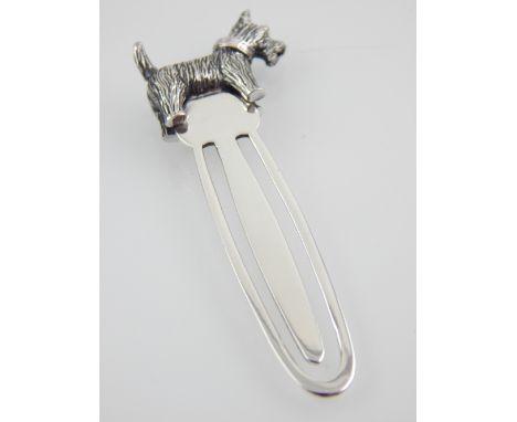 A silver bookmark, with Scottish Terrier finial. 