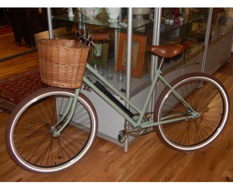 An Elswick Hopper ladies bicycle, circa 1965, fully refurbished and finished in a mint green livery, fitted with kevlar punct
