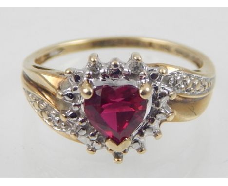 A 9ct yellow gold heart shaped ruby and diamond dress ring  