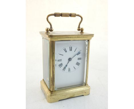 A French brass carriage clock, oval aperture, four glass, brass grade mechanism, possibly Duverdrey & Bloquel. 10.5cm