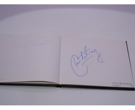 Autograph: An autograph album - numbered 176 containing circa 70 signatures collected in person by Laurie Butcher in 2001 / 2