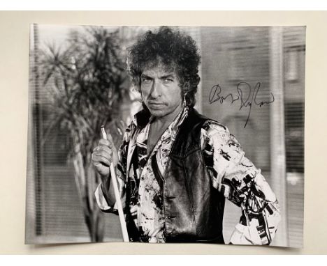 BOB DYLAN AUTOGRAPH - Personally Signed BOB DYLAN signature on a black &amp;white still from the 1987 film HEARTS OF FIRE - N