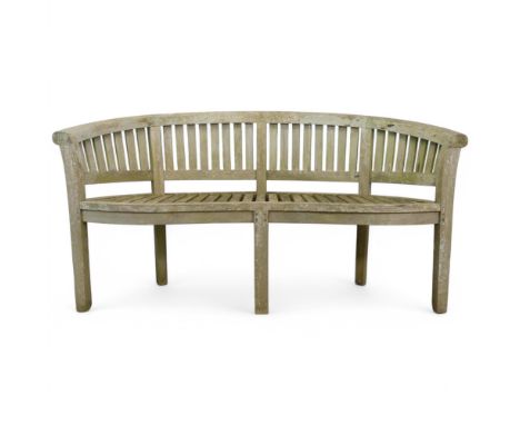 A weathered teak Lutjens style garden bench. Length 160cm, height 85cm, depth 65cm. WITH THE OPTION TO PURCHASE THE FOLLOWING