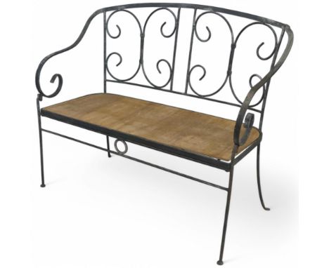 A vintage painted wrought iron garden bench with later ply seat. Length 118cm, Height 91cm, Depth 51cm.