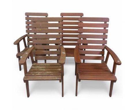 A set of four teak garden open arm chairs with slatted backs and seats, labelled for Swan Hattersley Garden Furniture.