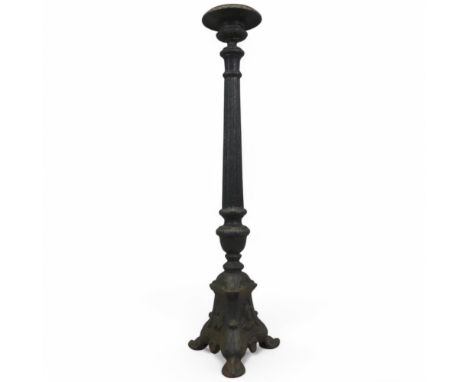 A painted cast iron candlestick, in the form of a Camapan urn raised on fluted column. Height 69cm.