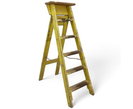 A vintage painted pine folding step ladder. Height 130cm.
